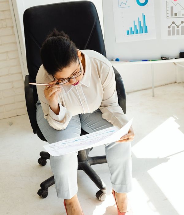 Woman professional financial analyst in business attire
